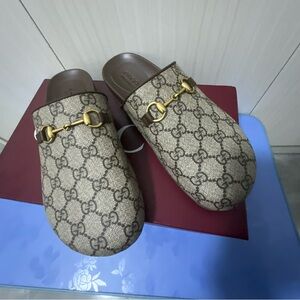 Gucci Beige Monogram Mules with Gold Hardware